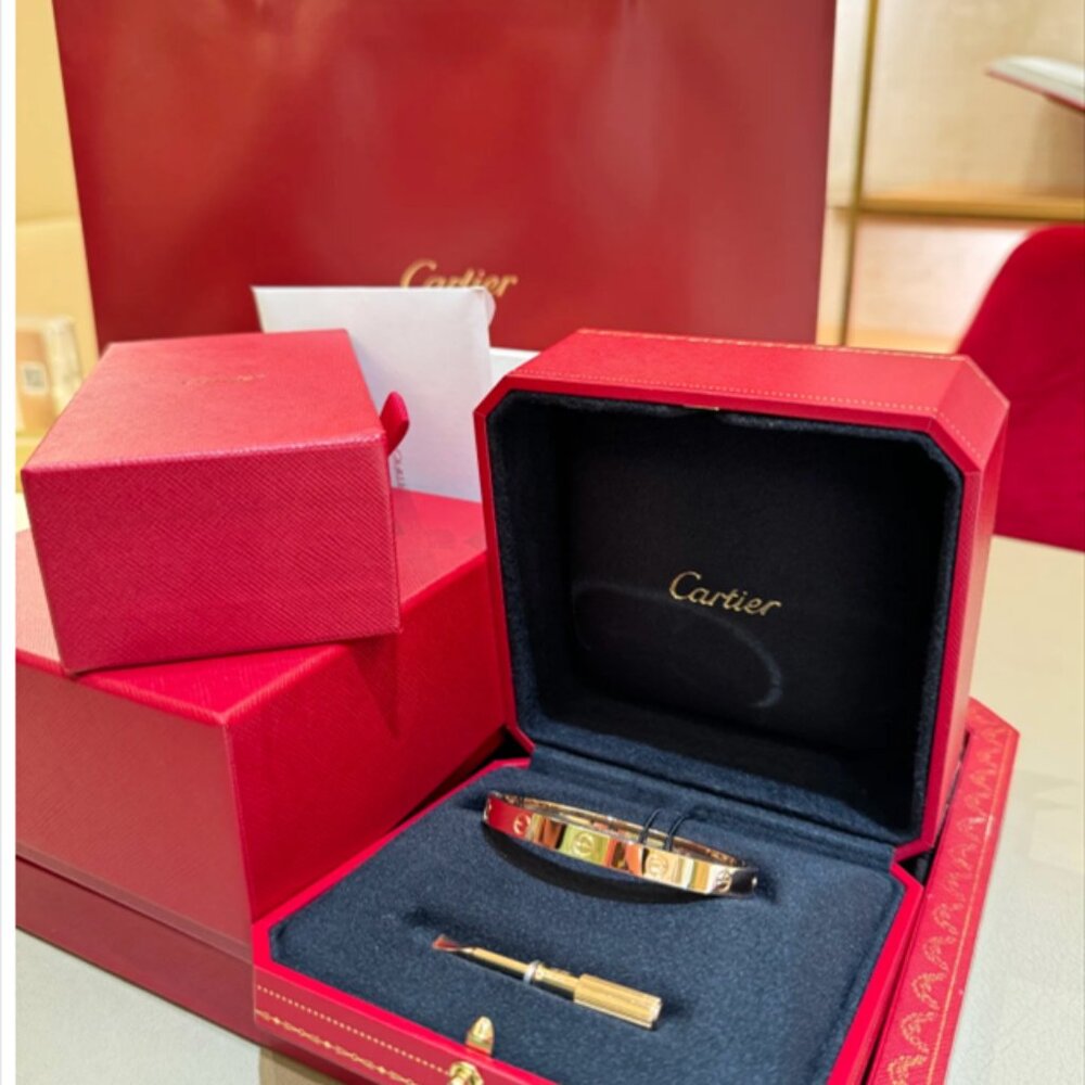 Cartier wide four diamond bracelet